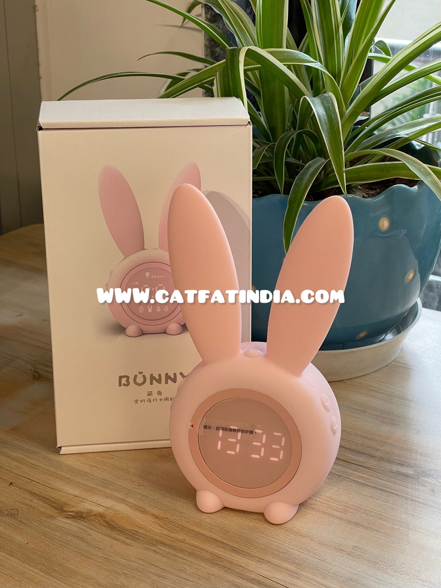 Cute pink bunny clock